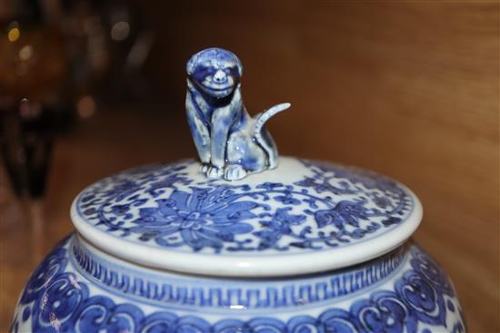 A pair of Chinese blue and white jars and covers, 19th century height 20cm